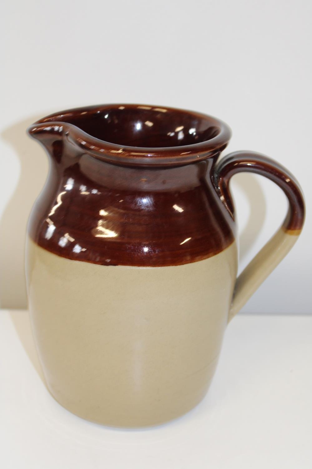A salt glazed jug h23cm