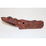 An unusual cinnabar crocodile figure