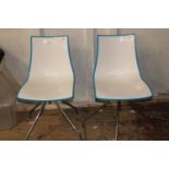 A pair of Italian designer swivel chairs by Scab Unable to post h82cm