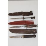 Three vintage sheath knives in various condition with correct sheaths