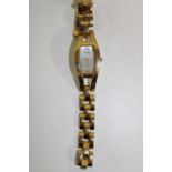 A boxed Ladies gold tone Fossil wrist watch
