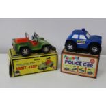 Two boxed vintage battery powered models (un-tested)
