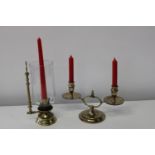 Two unusual brass candle holders