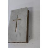 A hand carved marble bible 10cm x6cm x2cm