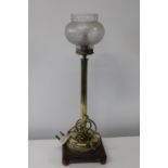 A vintage brass & glass oil lamp converted to electricity h57cm