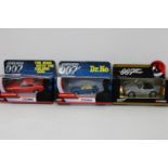 Three boxed Corgi 007 die-cast cars