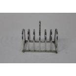 A rare six slice hallmarked for Chester silver toast rack