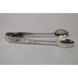 A pair of small hallmarked silver sugar tongs