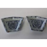 A pair of antique Chinese blue & white dishes (as found)
