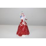 A boxed Royal Doulton figurine 'Christmas Mourn' HN3212