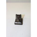 A small bronze Japanese seal with bust of a dog decoration.