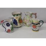 Four assorted ceramic jugs