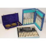 A set of vintage brass scales & two boxed sets of cutlery