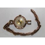 A Ladies 9ct gold bodied watch & strap (for scrap) 20 grams total