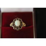 A vintage 9ct gold & opal ring