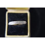 A 9ct gold & diamond message ring