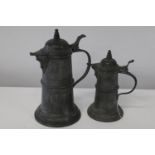Two antique pewter hot water jugs