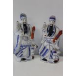 Two Chinese ceramic deity figures