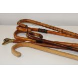 A selection of vintage wooden walking sticks