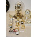 A large selection of assorted timepieces etc