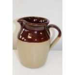 A salt glazed jug h23cm