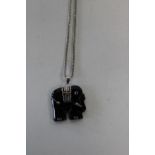 A black onyx & silver pendant & chain (pendant in the form of an elephant)