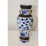 A Japanese blue & white vase (as found)