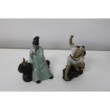 Two Chinese mud men figures