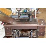 A vintage Singer sewing machine & base Collection Only