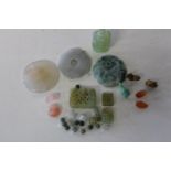A selection of assorted jade items