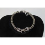 A quality 925 silver dragon form bracelet