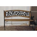 A wrought iron garden bench w126cm Collection Only