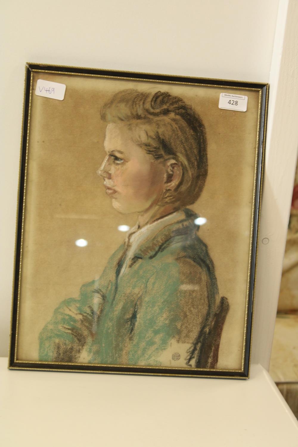 A nicely framed pastel portrait 40cm x 33cm