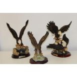 Three collectable Eagle figurines ( one ceramic & two resin) Regency Fine arts & Juliana