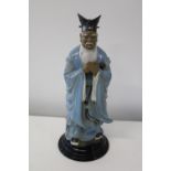 A Chinese ceramic deity figure h34cm
