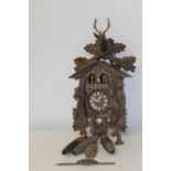 A Black Forest cuckoo clock (un-tested) has damage