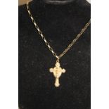 A 9ct gold crucifix on a 9ct gold box chain 13.2 grams