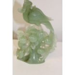 A green jade bird sculpture 21cm tall