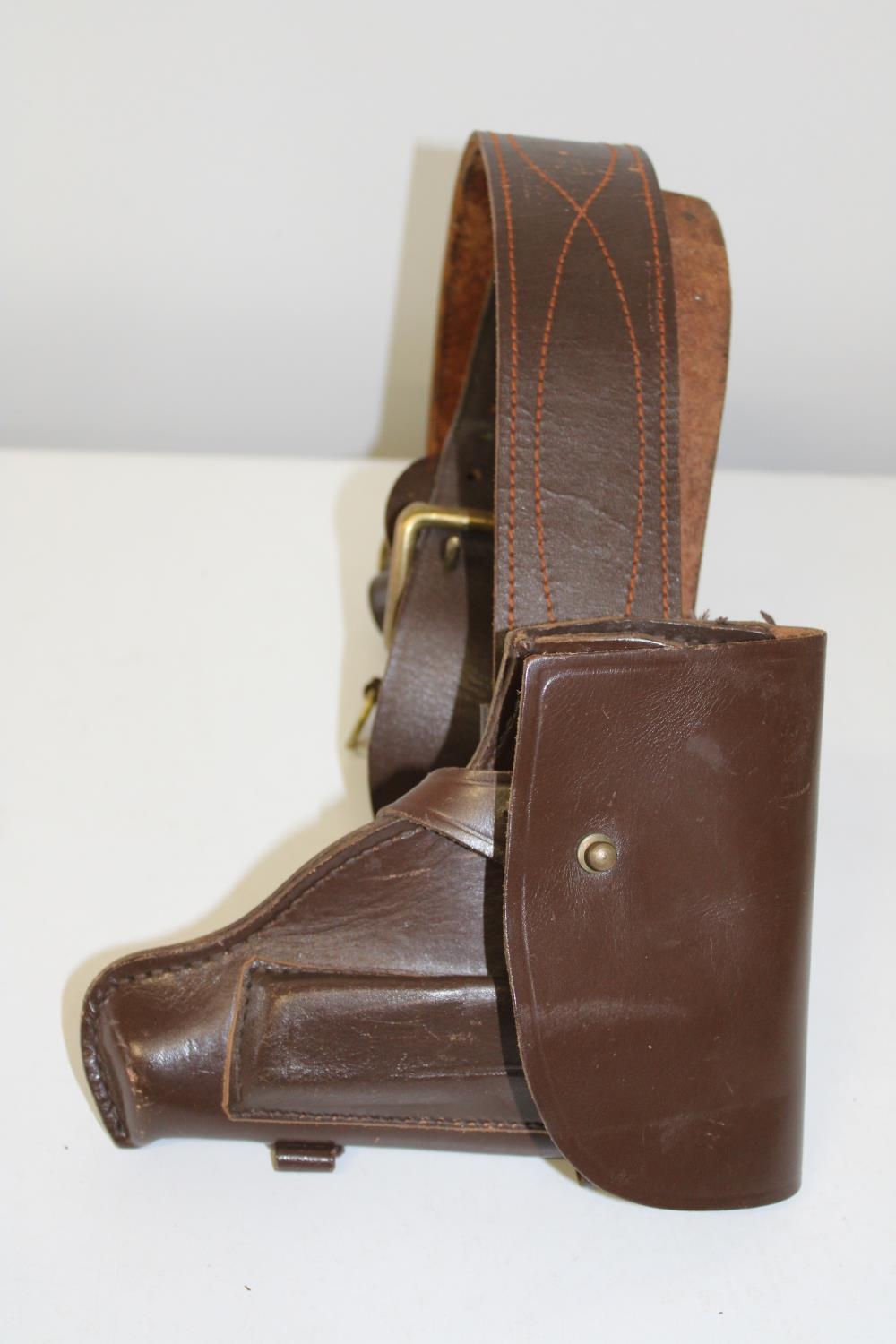 A re-production leather belt & holster