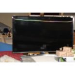 A Samsung curved smart TV & remote in GWO (4ft screen) Collection Only