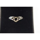 A 9ct gold wishbone heart ring size N