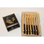 A Japanese lacquered box & set of vintage butter knives with hallmarked silver mounts