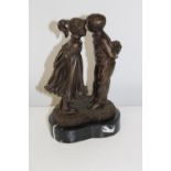 A bronze figurine on a marble plinth signed Peyre. 24cm tall