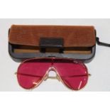 A pair oy Ray Ban Bausch & Lomb "Wings" pink tinted 1980's sunglasses with original case