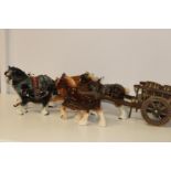 A selection of ceramic Shire horses & carts