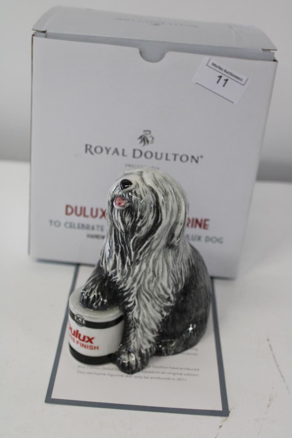 A boxed Royal Doulton Dulux dog with cert. h16cm