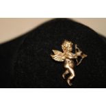 A 9ct gold cupid charm 4.8 grams