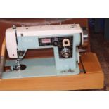 A vintage electric Alfa sewing machine (un-tested) Collection Only