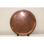 A Harold Barnes copper tray d36cm