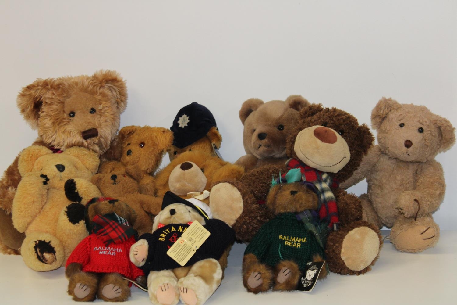 A box of assorted collectors teddy bears